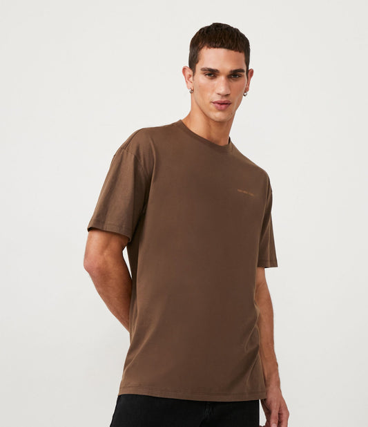 Camiseta de algodão de ajuste relaxado com letras do Party House Studios em marrom