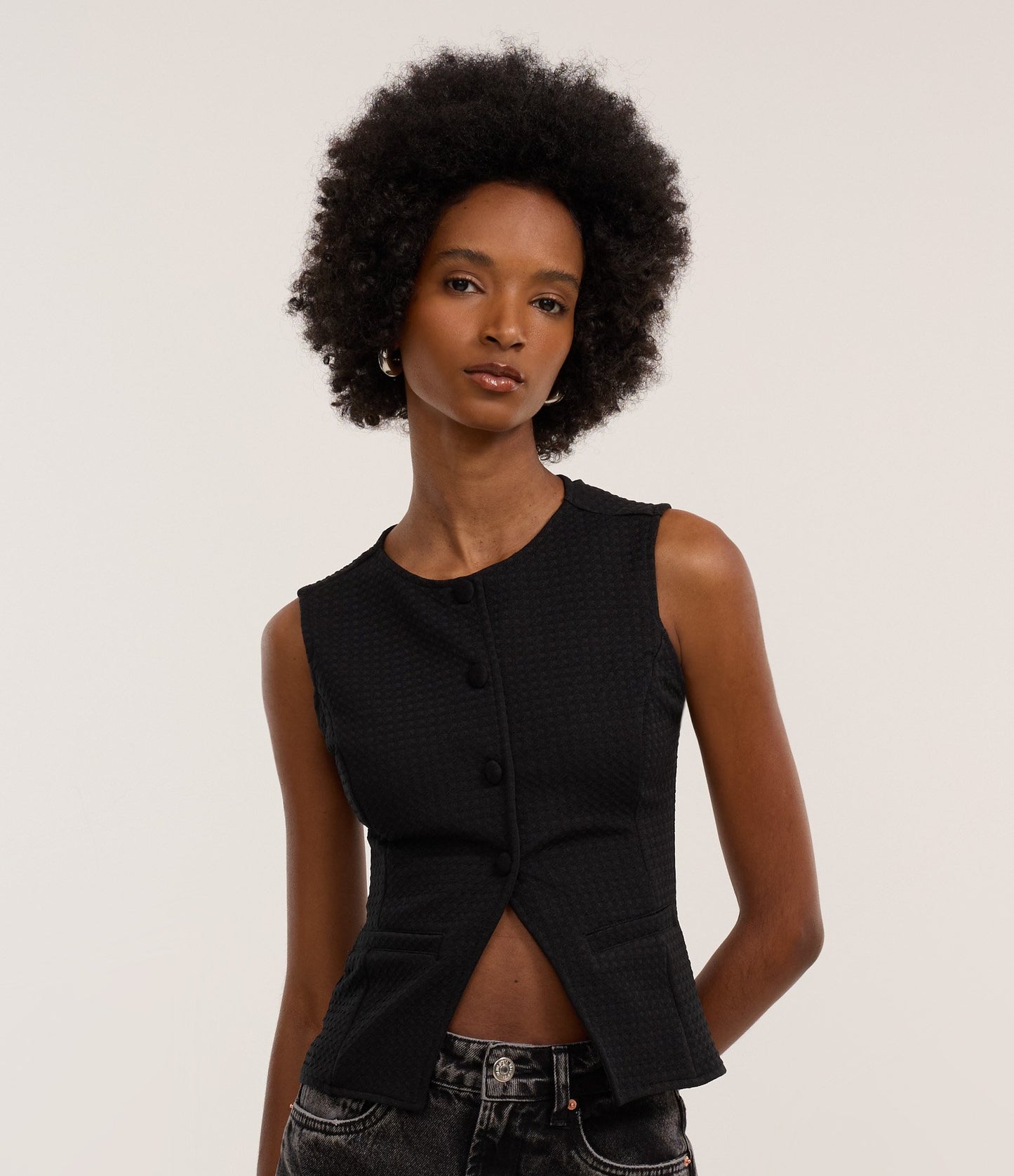 Textured Tailored Blouse with Hem Cutout in Black
