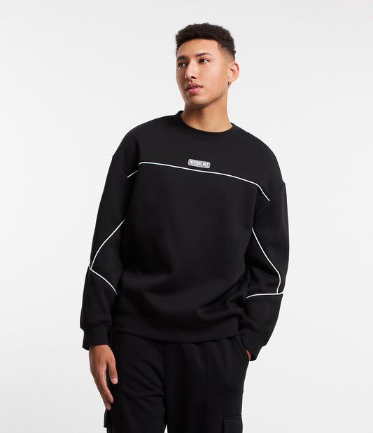 Sudadera relajada negra con parche y recortes