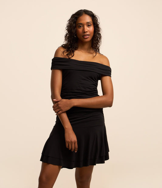 Vestito corto off-shoulder in jersey nero con drappeggio