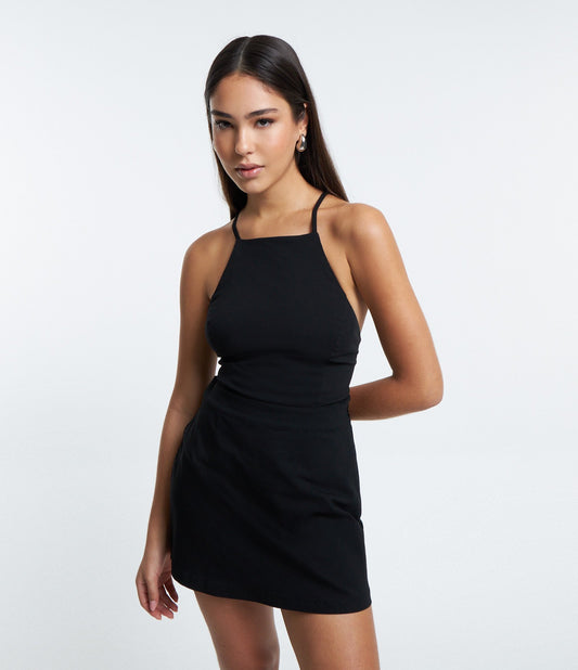 Vestito Romper bengalino nero con schiena aperta e spalline incrociate