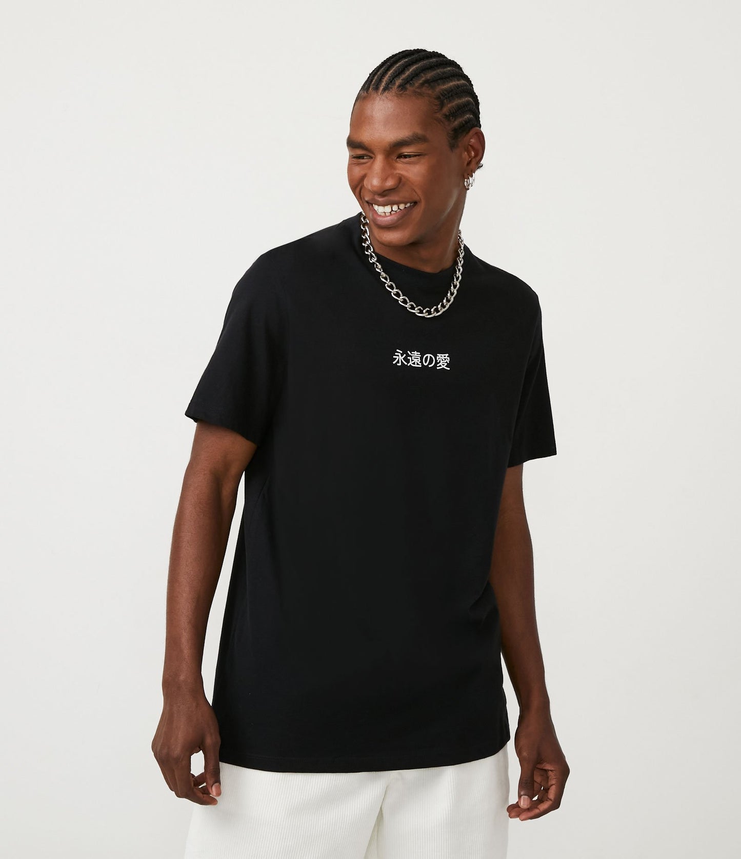 T-shirt in tessuto a mezza maglia con stampa di ideogrammi in nero