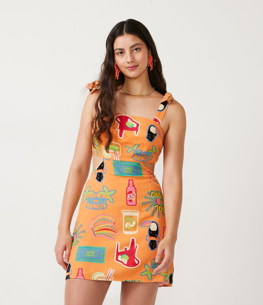 Vestido curto de linho com alça e estampa divertida de adesivos laranja