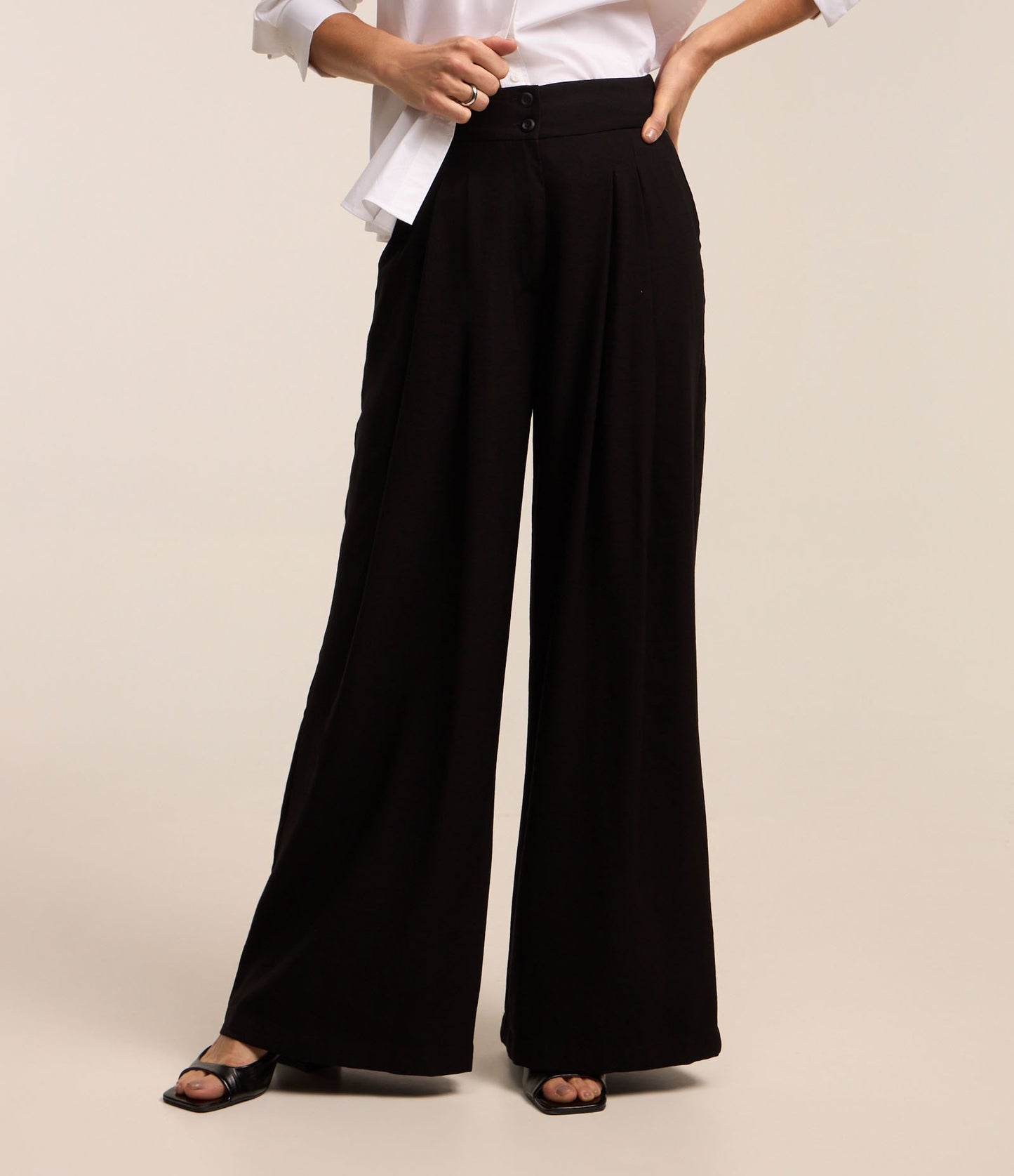 Wide-Leg Tailored Pants with Pleats and Black Waistband Buttons