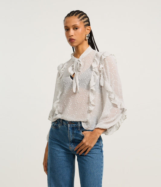 Blusa de gasa gris con lazo y volantes