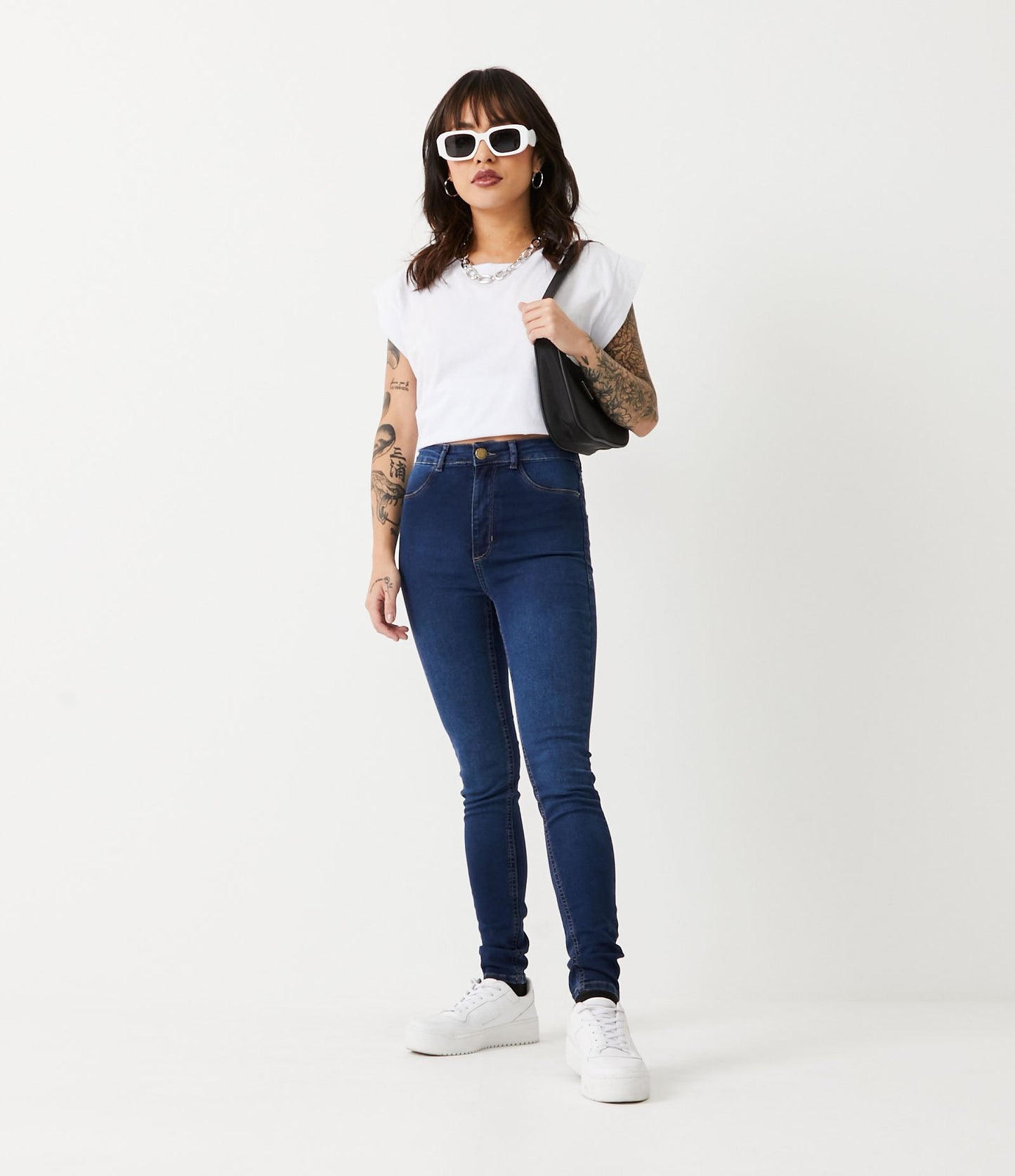 Calça jeans skinny de cintura alta em jeans azul