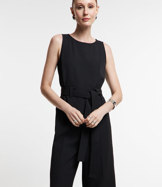 Tuta sartoriale con chiusura a zip sul retro e laccetto in vita in nero