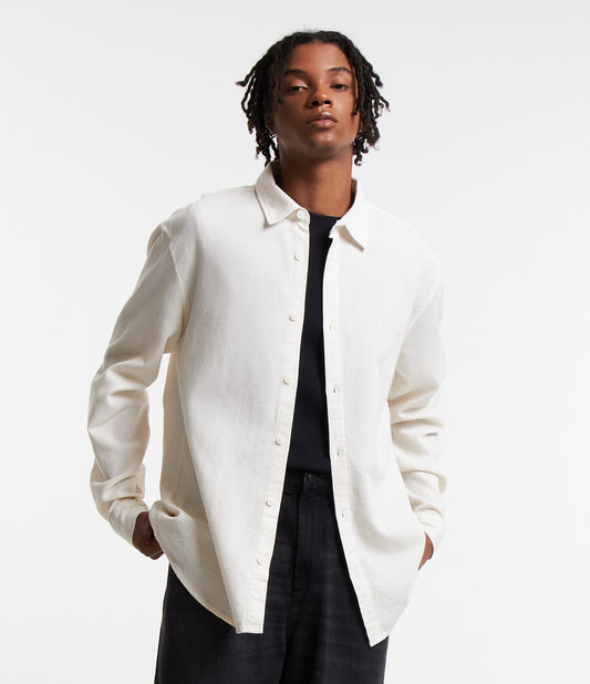 Blusa de tricoline texturizada com botões brancos