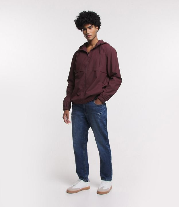 Jeans cropped slim con dettagli e tasche distressed in blu