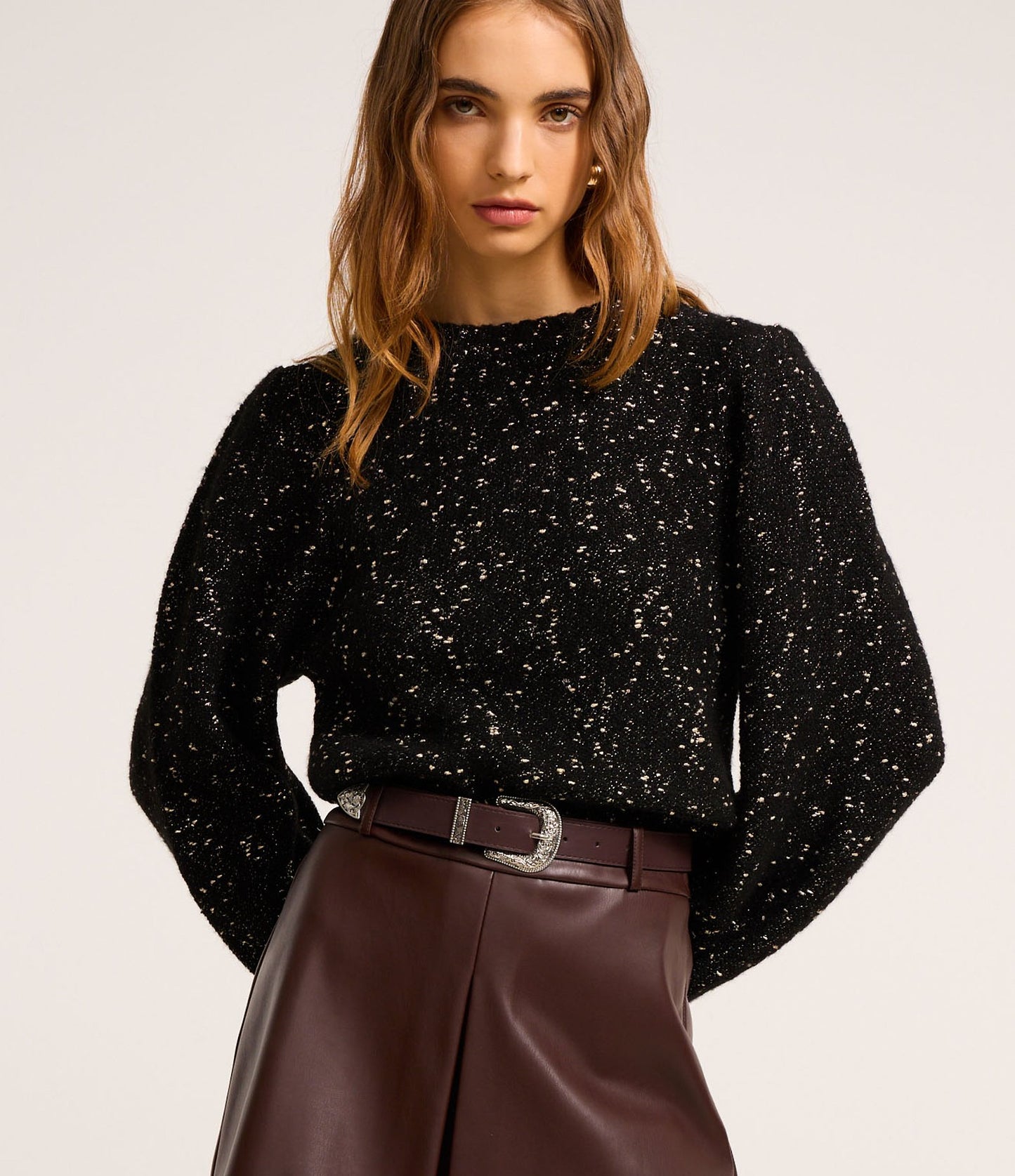 Jersey de punto bouclé de hilo metálico negro con mangas anchas