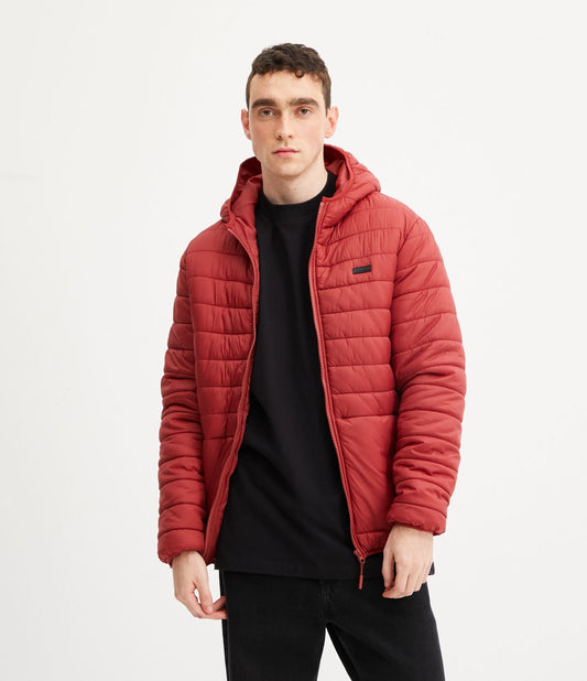 Giacca ultraleggera in poliammide rossa con cappuccio e design trapuntato