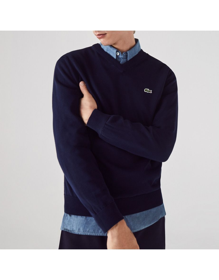 Jersey de algodón orgánico con cuello en V y logotipo bordado