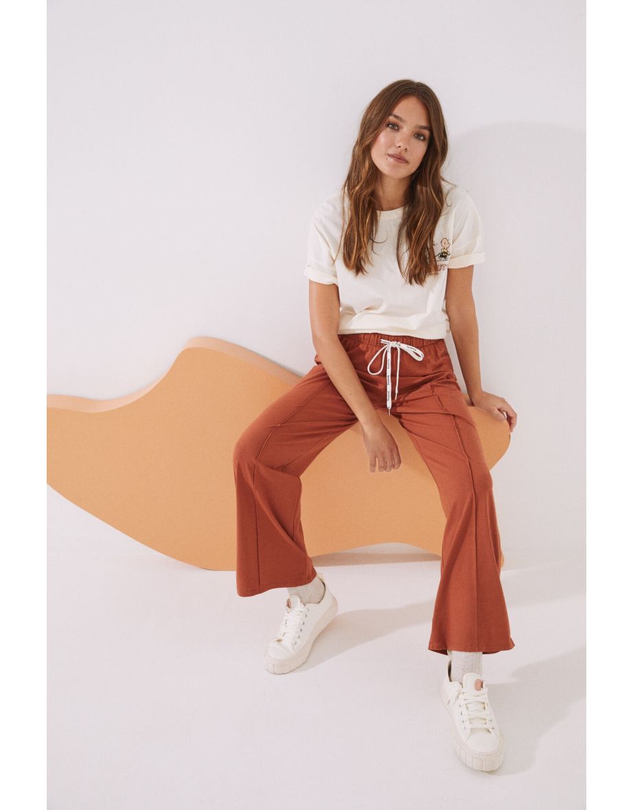 Pantaloni del pigiama lunghi Snoopy arancioni in 100% cotone