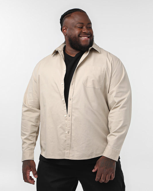 Camisa Masculina Plus Size de Manga Longa com Bolso em Bege | Original Plus da Riachuelo
