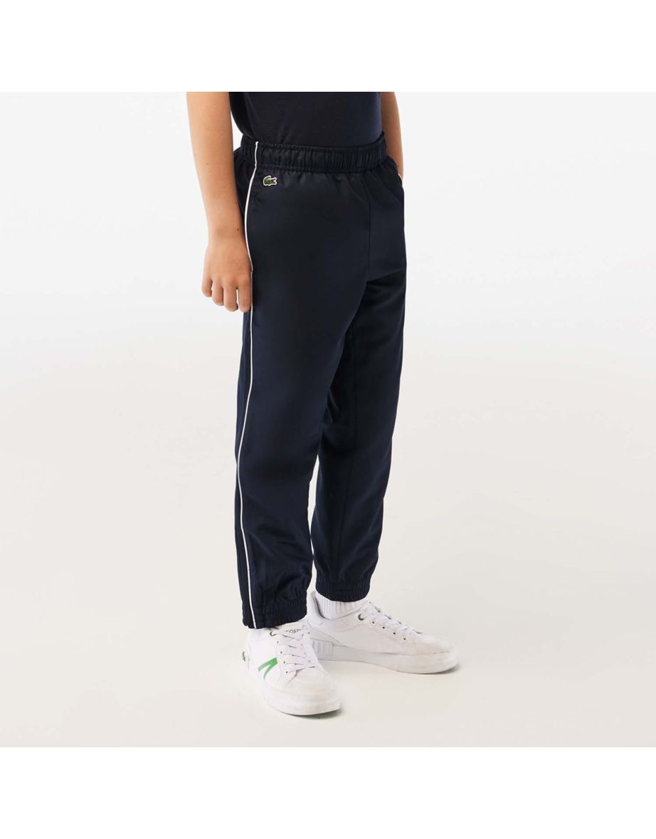 Calça esportiva de trilha Lacoste Junior para meninos em azul