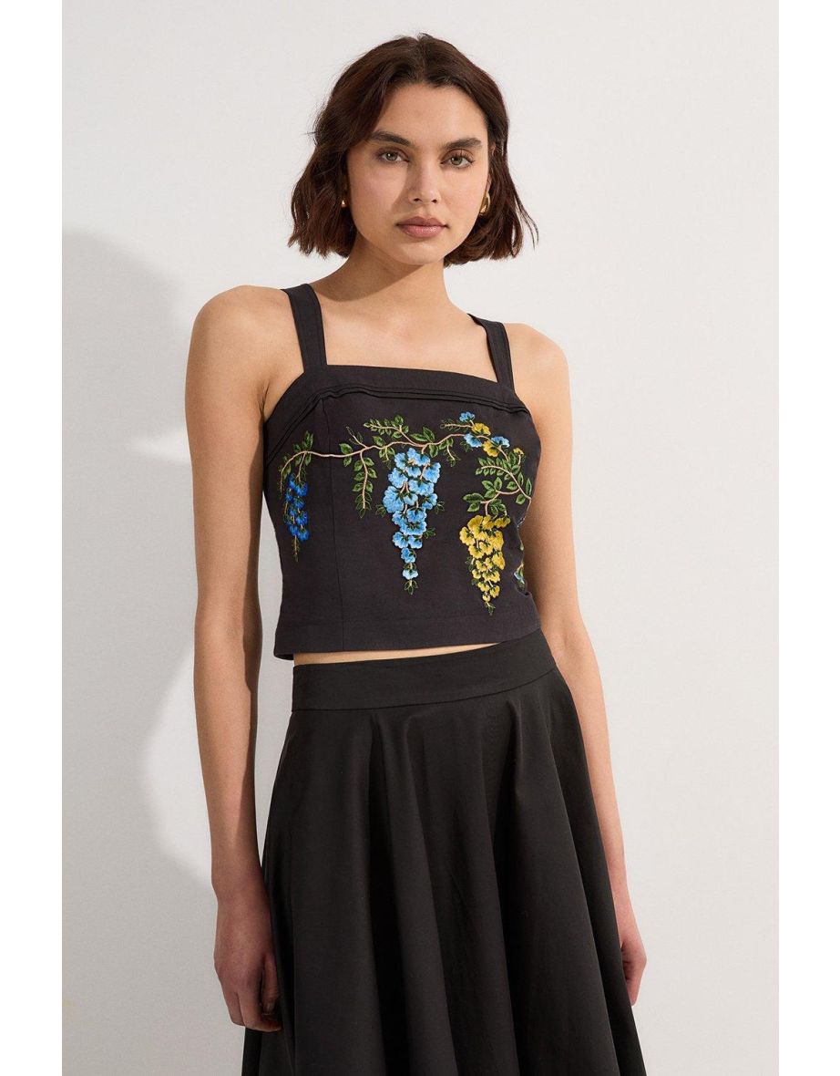 Camicetta alta con ricamo floreale