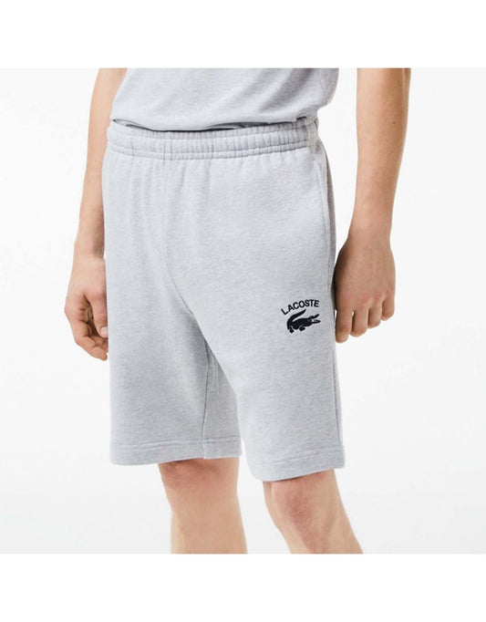 Pantaloncini da uomo grigi con ricamo Lacoste