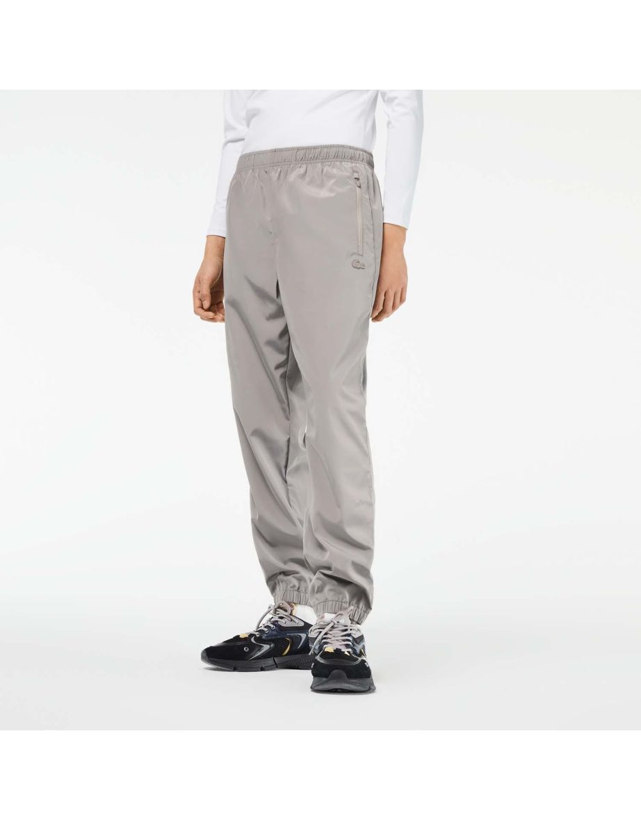 Pantaloni sportivi Lacoste grigi da uomo con coordinate GPS