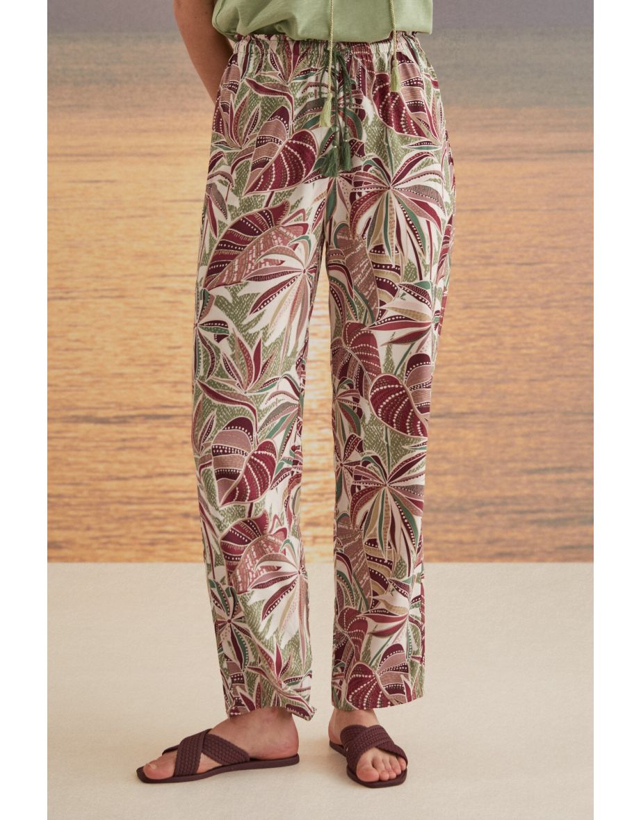 Pantaloni lunghi con stampa tropicale