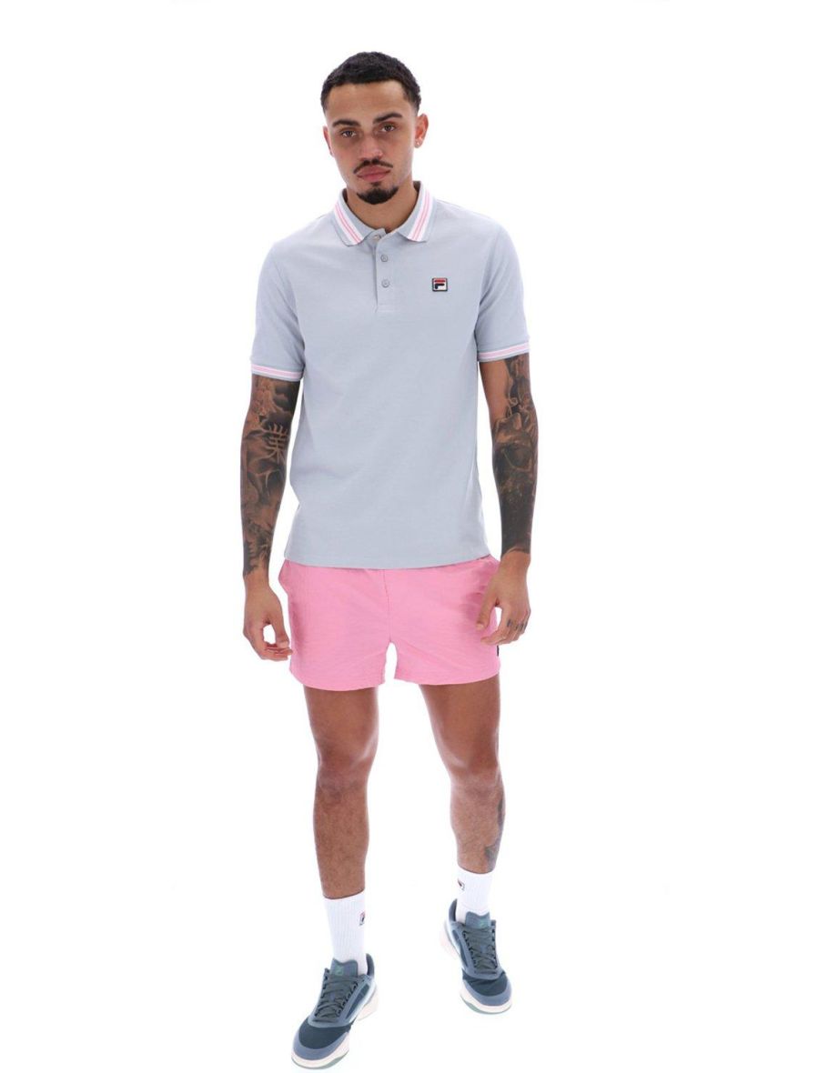 Polo de canalé con punta Faraz en rosa prisma de tiro alto y blanco